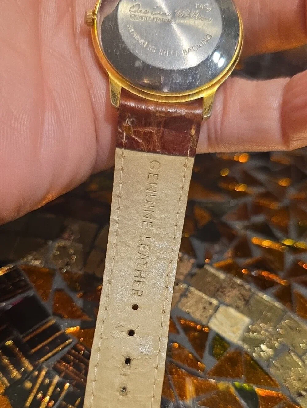 Vintage Gold-Tone Watch with Brown Leather Strap and Yellow Dial